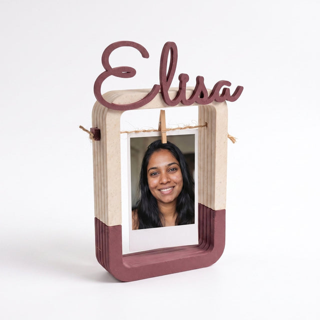 Personalised hanging photo frame with a name shaped across the top