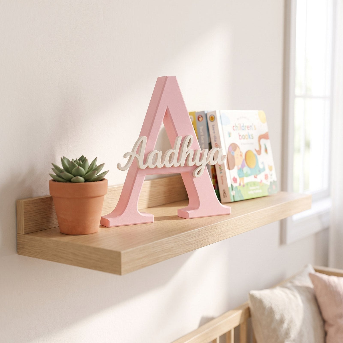 Personalised initial letter with a name in soft script