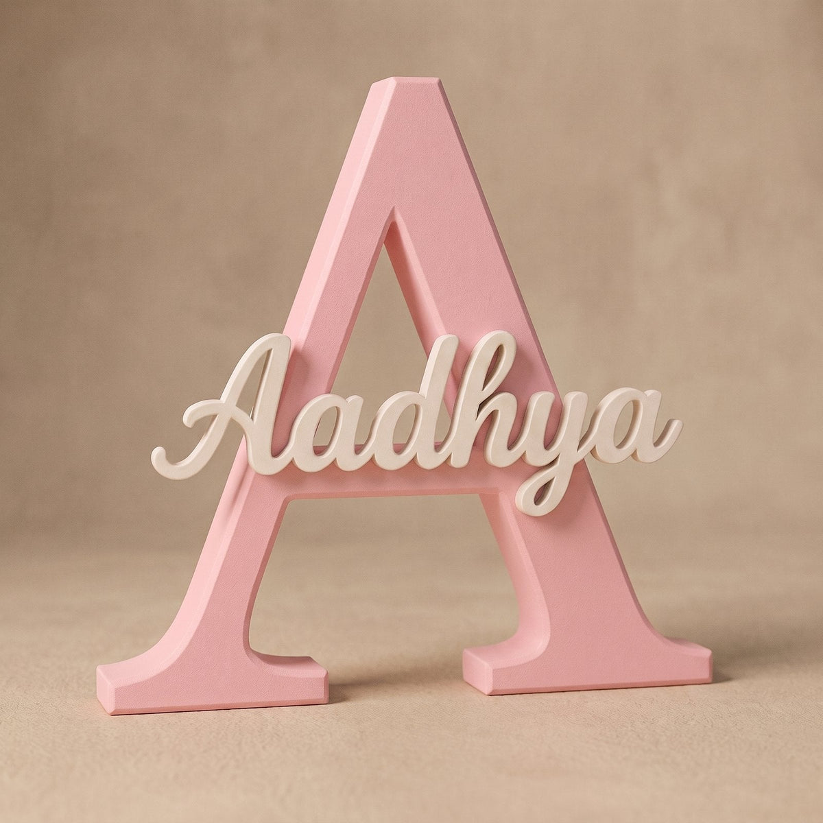 Personalised initial letter with a name in soft script