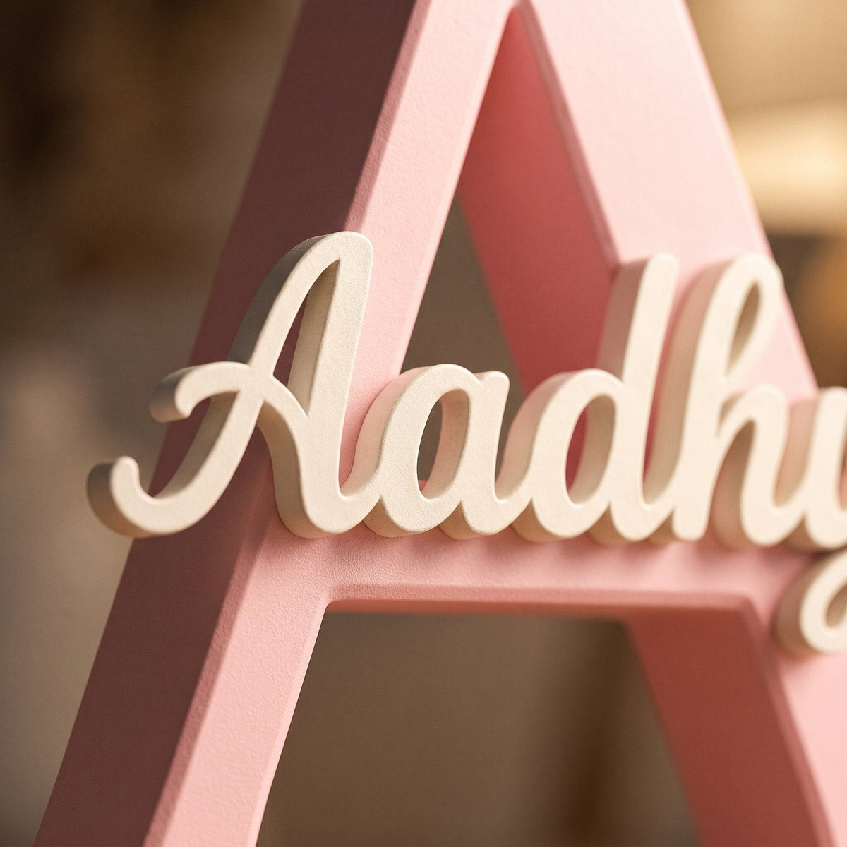 Personalised initial letter with a name in soft script